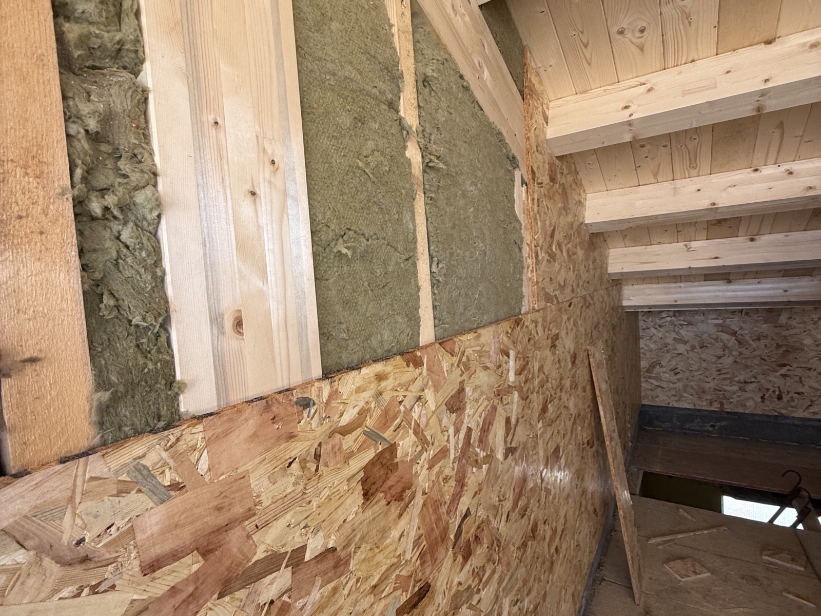 Sopraelevazione in legno di un condominio in via Martiri Angolani