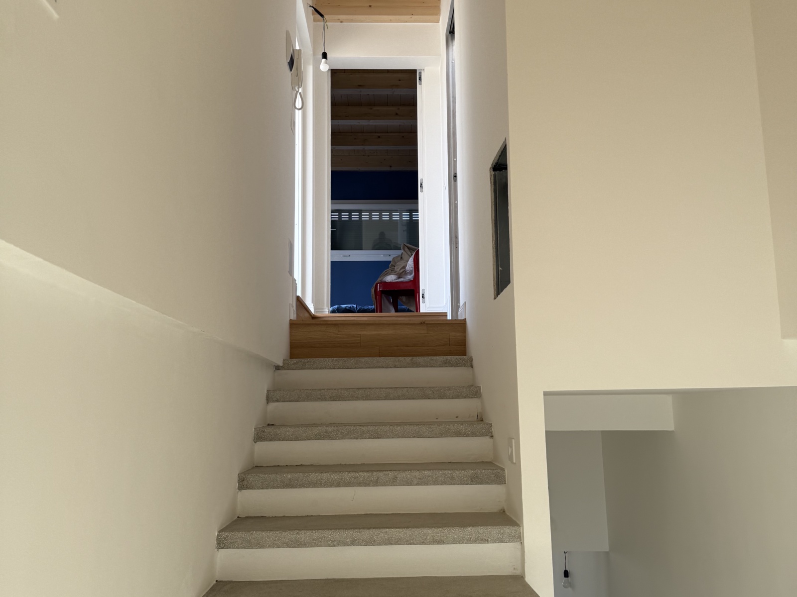 Sopraelevazione in legno di un condominio in via Martiri Angolani